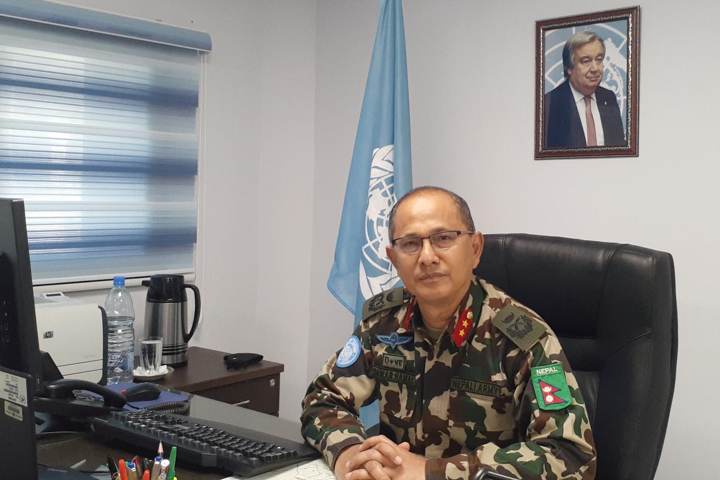 Force commander at their office